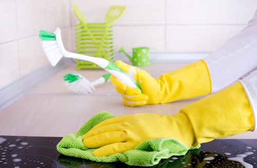 Technician preparing a carpet for steam carpet cleaning